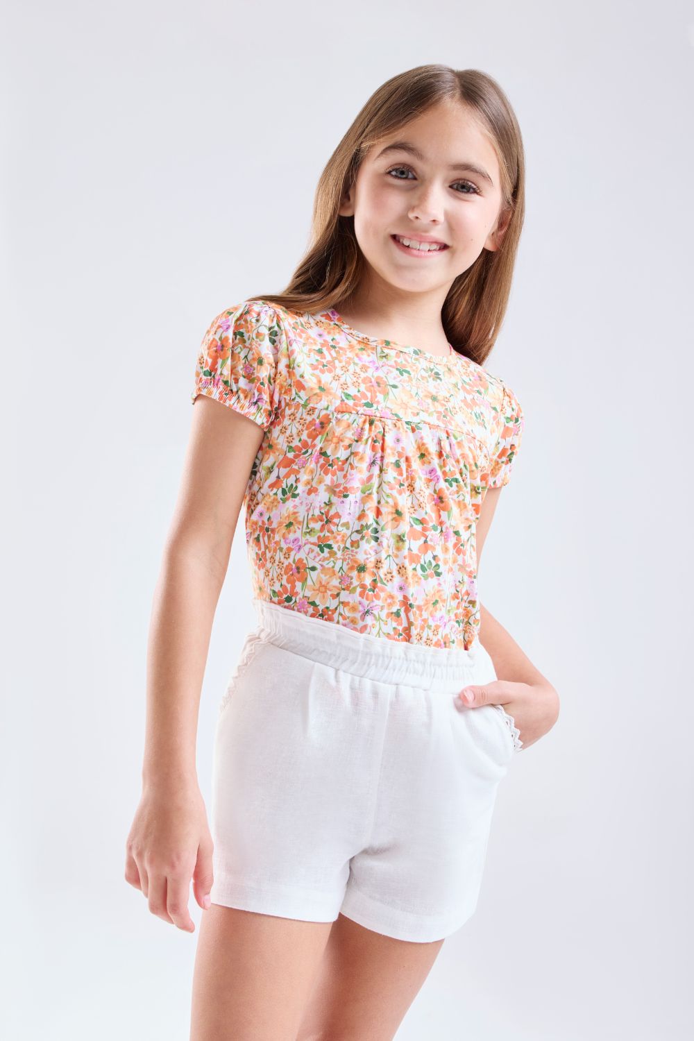 Short de lino ivory con pretina elasticada niña