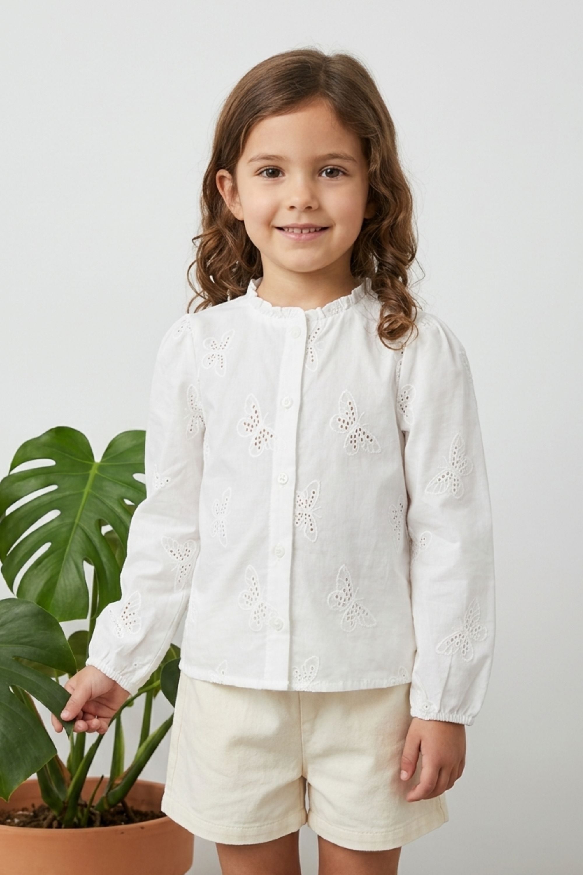 Blusa Emma ivory de mariposas para niña