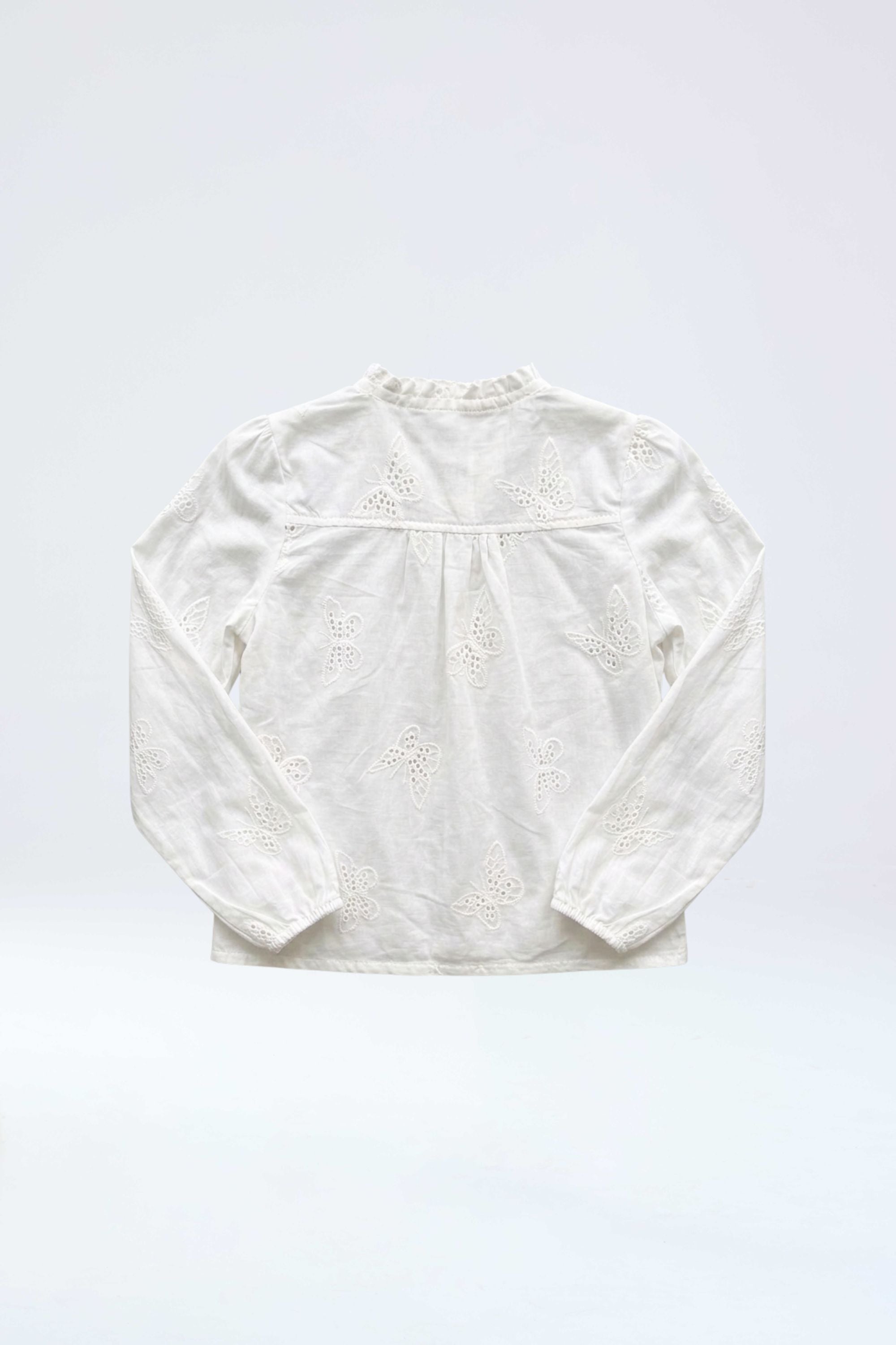 Blusa Emma ivory de mariposas para niña