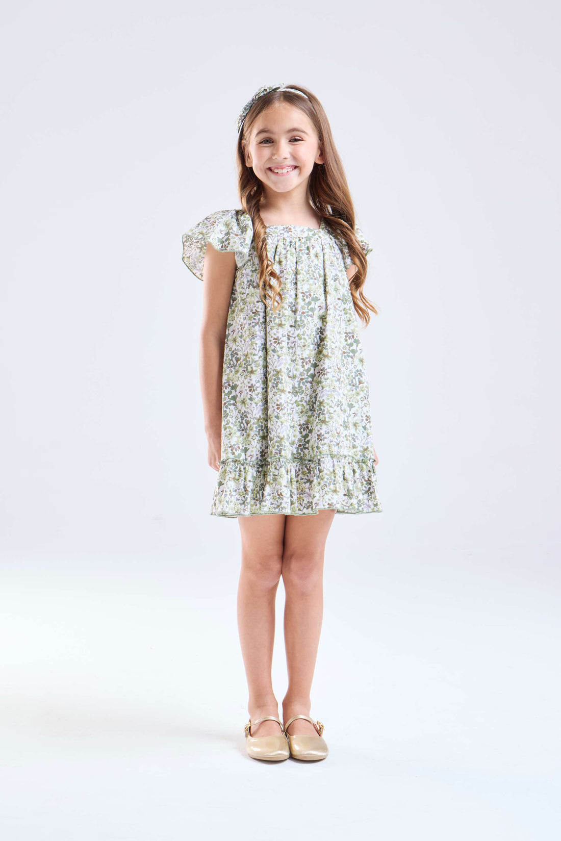 Vestido flores verde forrado de niña