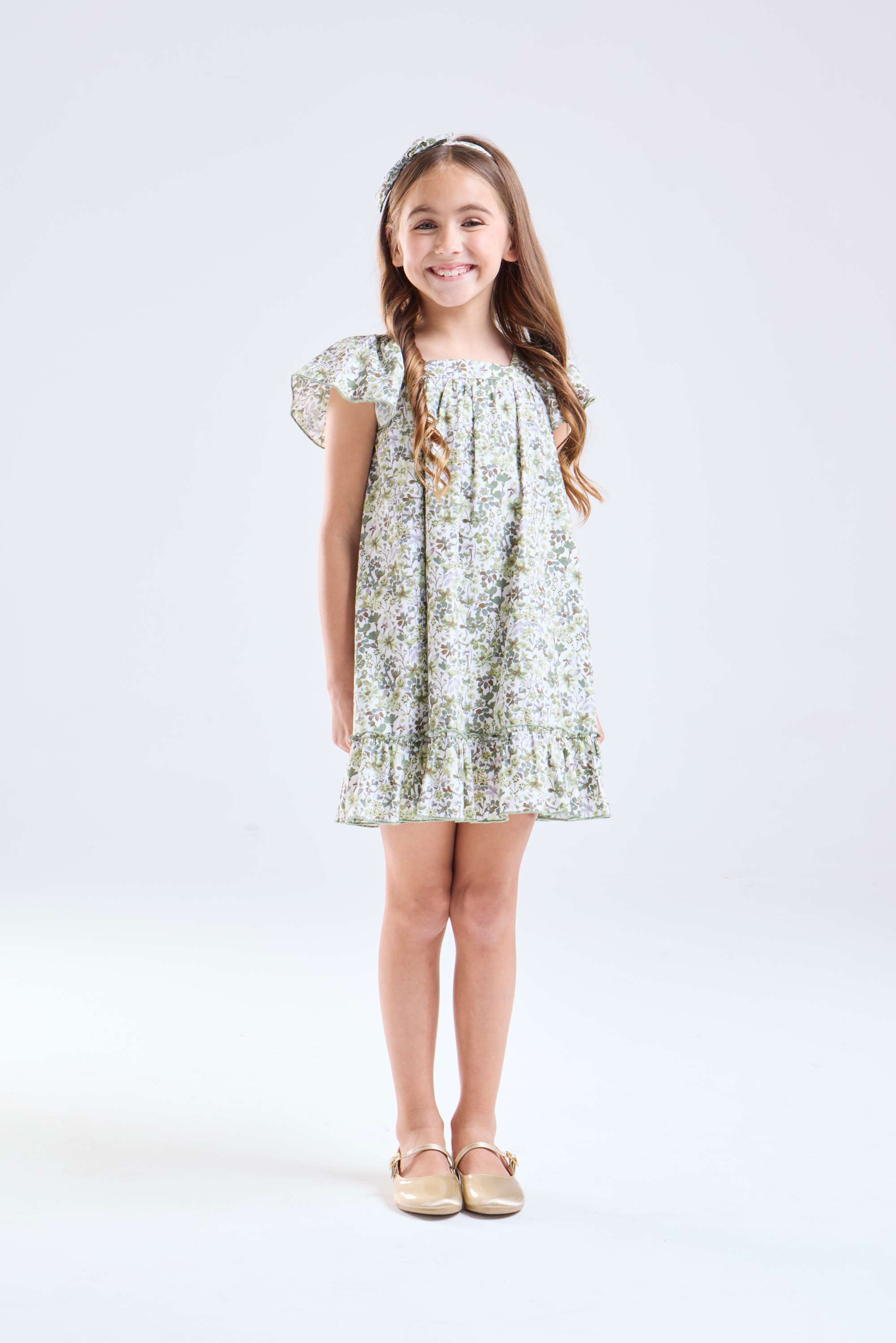 Vestido flores verde forrado de niña